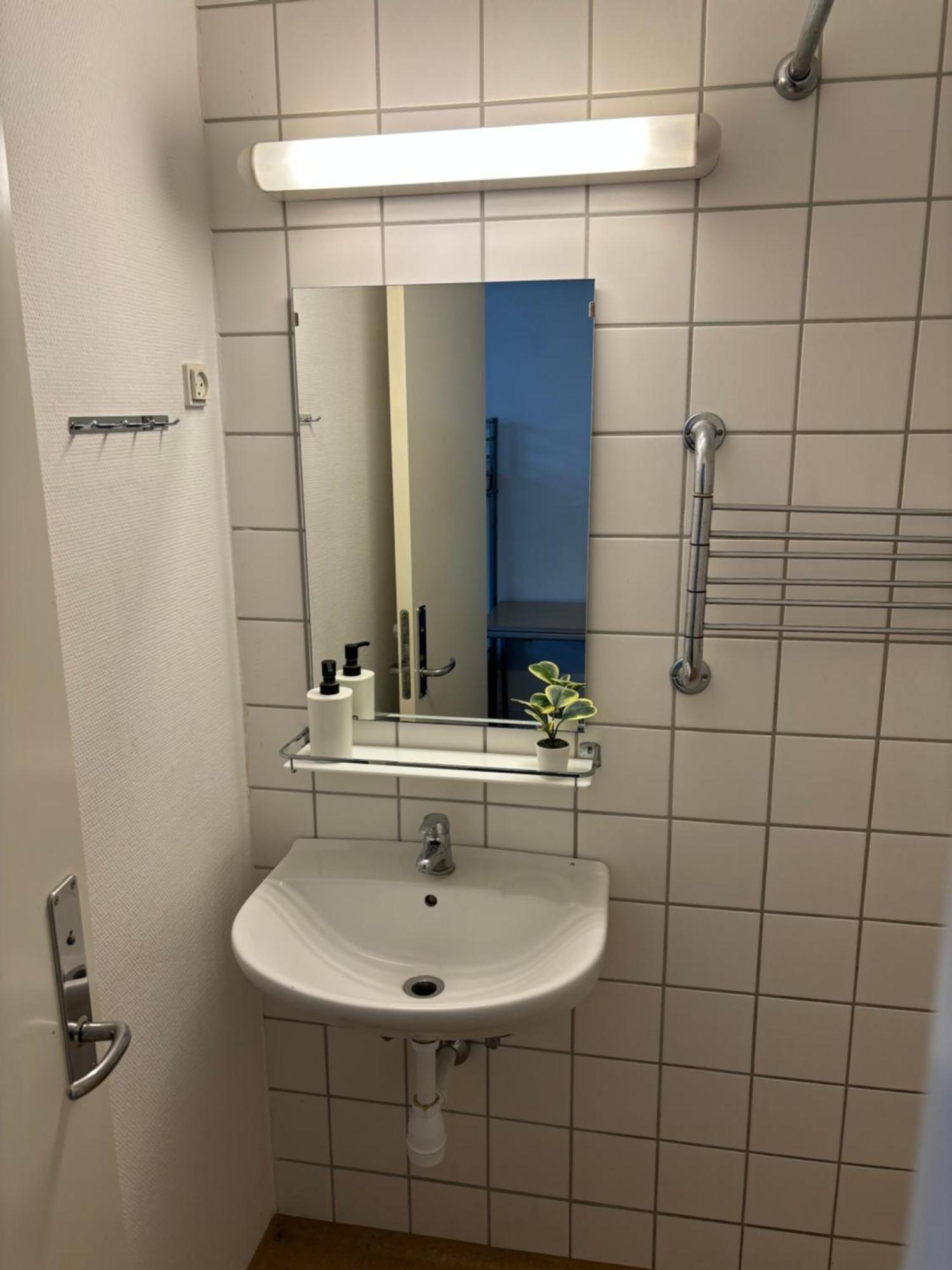 Danhostel Odense City Esterno foto Bathroom in a student apartment