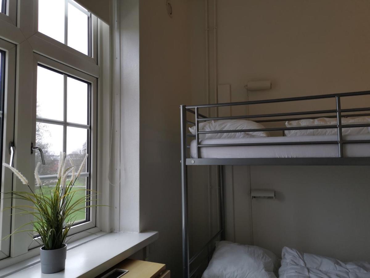 Danhostel Odense City Esterno foto A room at the hostel